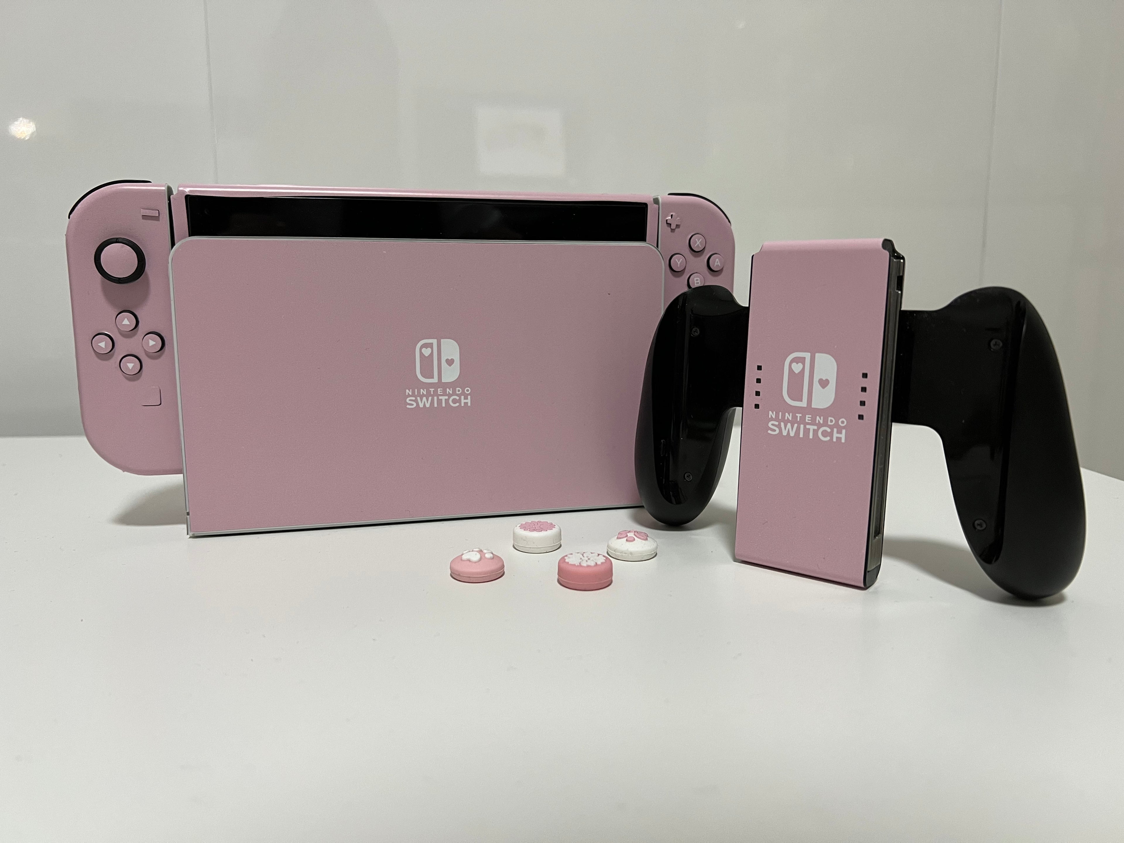 Load video: Unboxing and Making my Nintendo Switch OLED PINK. How to apply LuxSkinsOfficial skin.